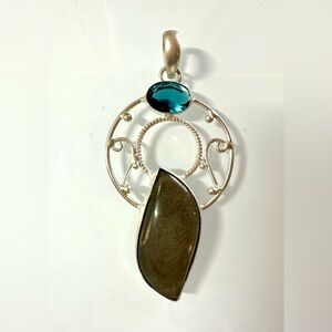 Elegant Silver 925 Obsidian Pendant with blue Topaz  gemstone.